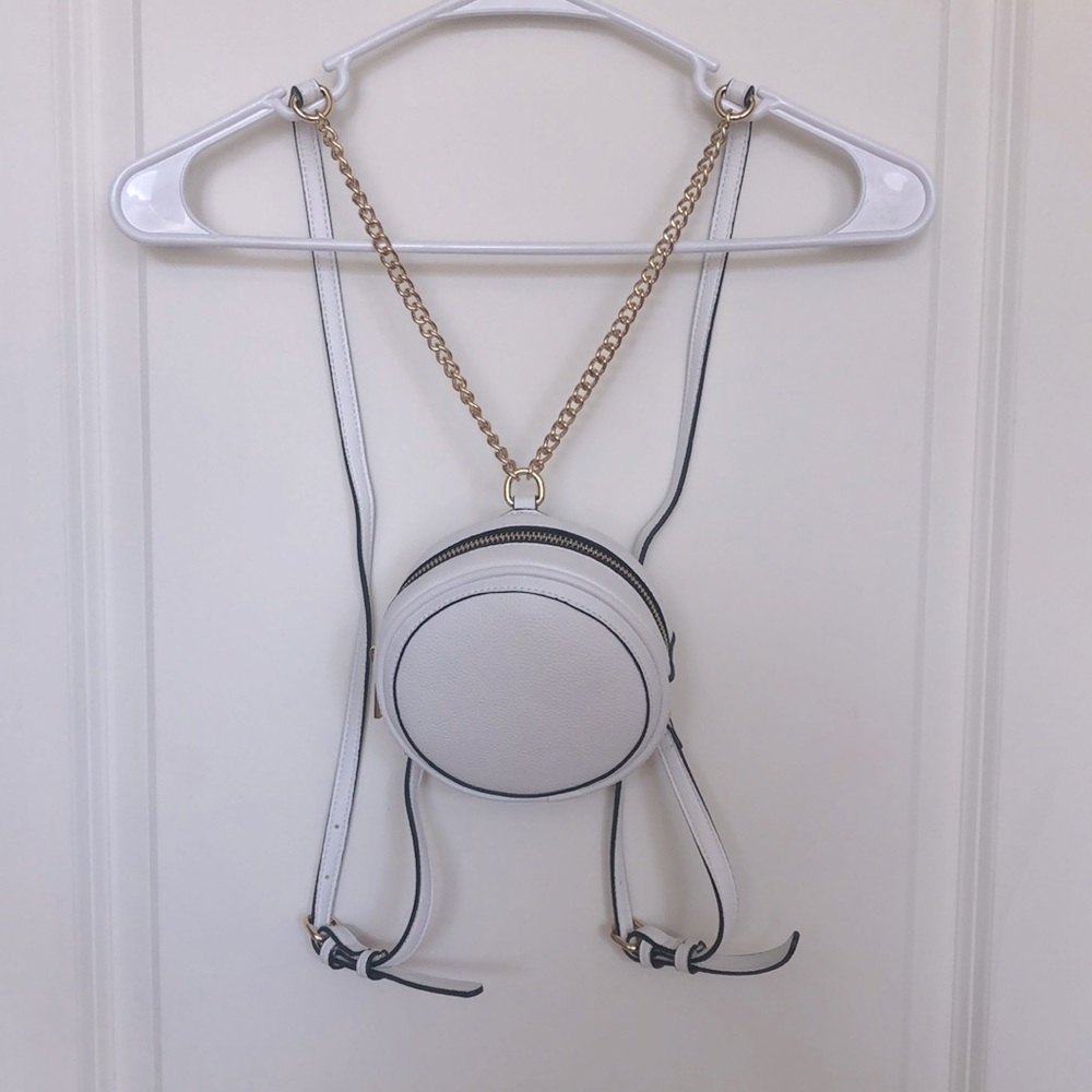 Forever21 white Faux Leather mini circle backpack